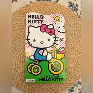 10/$25 • Hello Kitty- Here Comes Hello Kitty Boardbook
